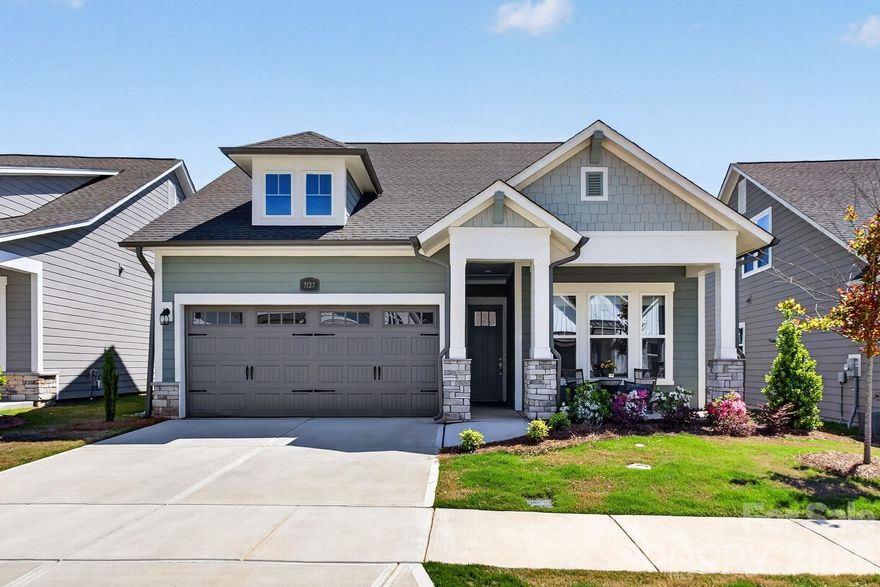 Get ready to fall in love with this gorgeous 1.5-story home in the award winning 55+ Community Encore at Streamside. This home is the perfect mix of comfort and style. With 3 spacious bedrooms, 3 full bathrooms, and 2452 square feet of living space, there's plenty of room to spread out and enjoy life.The heart of the home is an open, airy layout that's made for entertaining. Whether you're hosting a big gathering or just hanging out with family and friends, this home feels so welcoming and bright. You'll love the natural light! Step outside to the rear covered porch, and get ready to be wowed! It’s absolutely phenomenal — a true outdoor living space where you can relax or dine. This beautiful home is located in the highly desirable area of Waxhaw with easy access to shopping and recreational amenities. With its modern design, high-quality finishes, and desirable features, this home is a must-see.