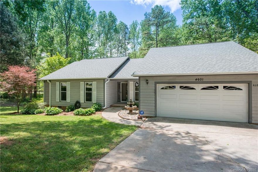 Exceptional location on gorgeous lot. Spacious greatroom w/cathedral ceiling,large sunroom has 10 windows overlooking the beautiful yard & opening to a big deck. Huge master bedroom w/cedar closet. Good sized kitchen and formal dining room, small sitting room and separate office. 1 minute to 485, 4 minutes to downtown Mint Hill. When the owner built this home he had the wall removed between bedrooms 2 and 3. We have an estimate to replace the wall if buyers request.