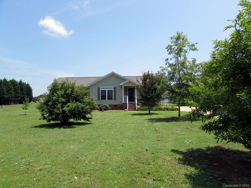 Cute ranch home sitting on an acre. Large sunroom w/new floors, new flooring in all bedrooms, neutral paint throughout. Neat as can be!