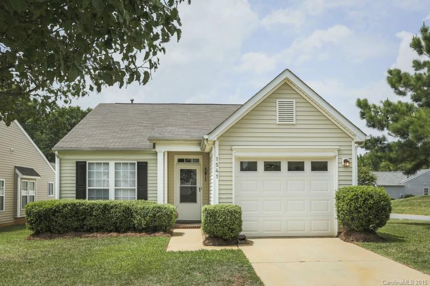 Immaculate open floor plan ranch boasts new carpet, paint & wide-plank easy care laminate floors. Split bedrooms- spacious master w/ walk-in closest, ensuite bath w/ a garden tub. Secondary bedrooms share a hall bath. The great room, dining and kitchen flow into each other. Kitchen has new sink, countertops & includes a refrigerator. This bright & inviting home is move in ready. Private fenced yard & attached garage -  all located with easy access to uptown, Northlake Mall and Mountain Island!