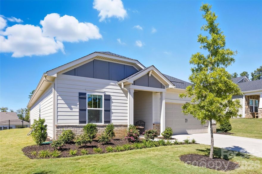 Now priced at $493,500, this nearly-new 2024 ranch delivers luxury, lifestyle, and value in one of Charlotte’s most desirable lakefront communities. Featuring 3 bedrooms, 2.5 baths, and a versatile flex room, this spacious layout is ideal for modern living.

The gourmet kitchen is a showstopper. Complete with double ovens, gas cooktop, upgraded cabinetry, and premium finishes throughout. An open-concept design flows effortlessly into the main living area, making entertaining or everyday relaxation easy.

Enjoy a fenced backyard, covered patio, and a quiet lot with no power lines or obstructions, (which is rare) features that enhance both privacy and outdoor living.

Additional highlights include: Oversized primary suite with spa-style bath...Resort-style amenities including pools, tennis courts, trails, and lake access...Scenic community with vibrant neighborhood energy…Backyard ready for you to add your landscaped design for additional privacy.

Move-in ready, with a flexible closing timeline available. Updated pricing reflects motivated sellers and a market-smart approach. Act now to secure this premium home before the New Year rush. It's waiting just for you. Schedule your showing today!