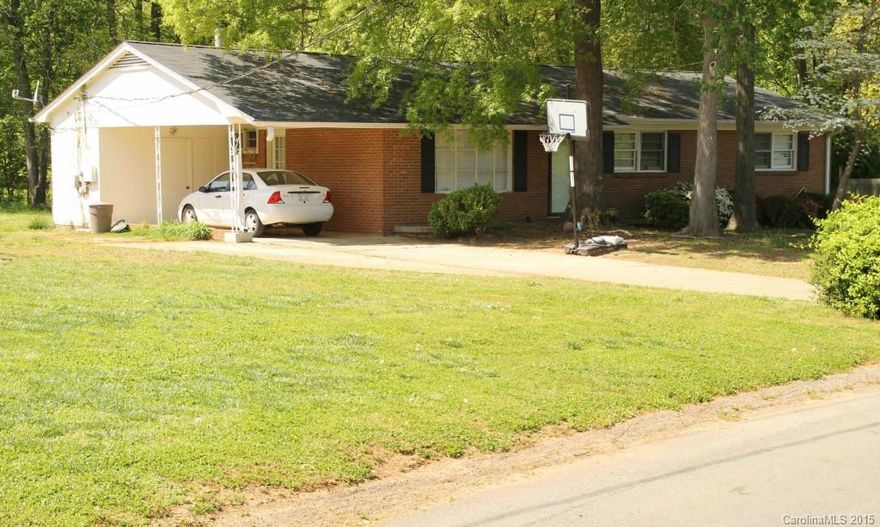 Total brick on 1/2 acre lot. Great schools. Convenient to airport. Large bedrooms