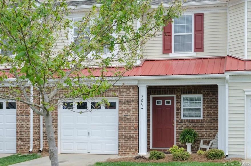 Immaculate,ready to move into 2 Master / Over sized Bedrooms w/ cathedral ceilings 2.5 BA town home, freshly painted inside in soft creamy neutrals throughout.Loft area and laundry upstairs. Open kitchen, dining area into living room, brightly sunlit open floor plan. Back patio overlooks green space behind. Low county taxes in a high growth area that is convenient to community pool/amenities, schools, shopping & dining & minutes to Charlotte