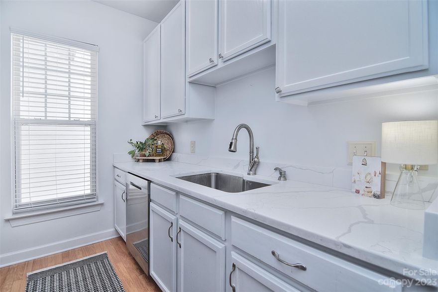 **** THIS BUILDING IS EQUIPT WITH AN ELEVATOR**** Discover condo living in this two bedroom two bath condo not far from Lake Norman! This thoughtfully designed space boasts a seamless blend of style and functionality. Enjoy the open concept layout filled with natural light and beautiful finishes throughout. The two bedrooms provide comfort and flexibility while the two FULL bathrooms are perfectly located in this split floorplan unit. This condo offers a perfect combination of convenience and modern living. The Oakhurst community offers a POOL, tennis courts and a play ground area, and is also closely located to retail and restaurants!