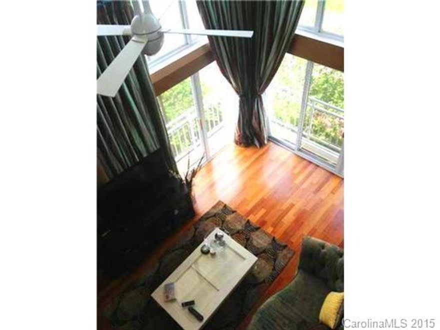 3 bedrooms, 2.5 bathrooms, corner unit with loft, garage and private terrace! Warm hardwoods on main level, master suite down, floor to ceiling windows. Chef's kitchen boasts stainless steel appliances, updated hardware, oak cabinetry, upgraded faucet, Corian counters and large pantry for storage. Upstairs are two great sized guest bedrooms, full bathroom, pull down storage, computer niche/office and loft overlooking great room. Extra large garage with added storage space is also included.