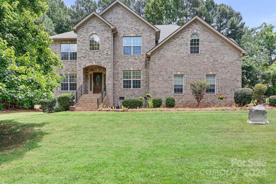 Big and beautiful, this 4 bedroom, 4 bath home sits on a treed lot w/seasonal water view out front. Frank Betz plan highlights an ample foyer, flanked by a study w/beautiful built-ins & formal dining room. Sellers favorite has been celebrating Fall and Winter holiday meals in this awesome DR while looking out at Lake Norman.Expansive Great Room w/coffered ceiling opens to kitchen offering a feeling of connectedness.  Double ovens and a walk in pantry add functionality to this expansive kitchen. Secondary bedroom with a full ensuite bath also accessible from hall on the main floor.  All other bedrooms PLUS possible 5th bedroom PLUS step up bonus room are up. Primary bedroom is large w/equally large primary closet. Exciting refreshes have been done to include: whole interior just painted, all first floor hardwoods have been sanded and refinished. HVAC replaced 2019, new well, well pump, whole house water filtration 2019.  Ideally carpet needs to be replaced. List price reflects this.