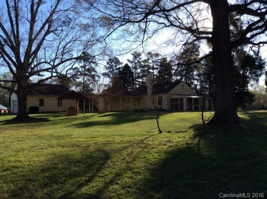 11.05 acres in East Rowan School District. House has 2 bedrooms, 2 full baths, large living room w/office area, & kitchen/dining. 2 porches-10x24 sunroom & 10x36 screened porch. Detached double garage. Land has been used for years as cow pasture. Much of the land is fenced and there is a barn, stables, and equipment sheds. The property tax value is lower than the county's market value because of its agricultural use. TV is $143373. County Market Value is $211168.