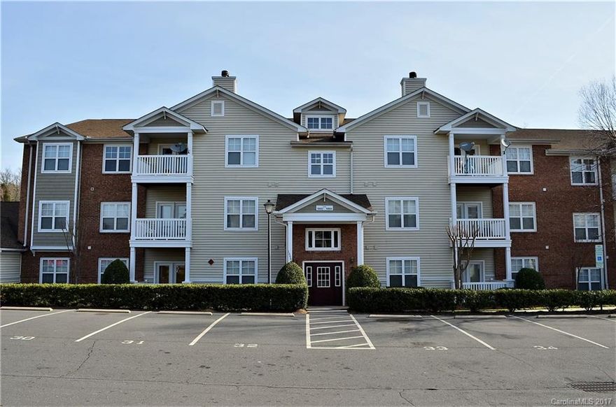 Terrace with a View!! This is Condo Living at it's Best!! You will immediately fall in love with the comfortable feel of this home boasting 2 spacious bedrooms and 2 baths, Open Floorplan, Kitchen with tons of cabinet space, Office with French Doors, Large Master Bath plus a private balcony that overlooks the Pool area. All located in a great community with pool and Fitness Center. You DO NOT want to miss this one! 1 Year Warranty Included... Close to UNCC, restaurants and shopping.