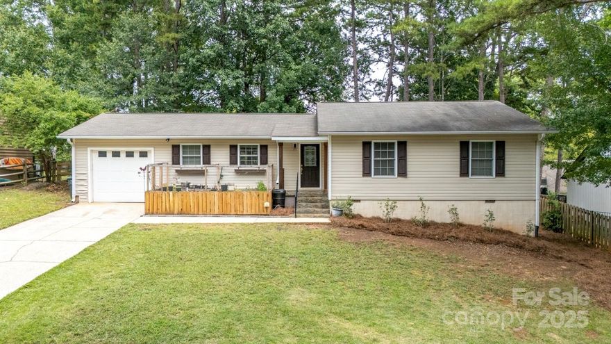 Lake view, large flat yard, fully updated, and truly move-in ready. This Tega Cay ranch offers the lifestyle you’ve been waiting for. Inside, enjoy new LVP flooring, fresh paint, updated lighting, and an open floor plan perfect for everyday living and entertaining. The kitchen features updated cabinets, kitchen island with breakfast bar, stainless steel appliances. Step outside through new French doors to a spacious backyard where you can relax by the fire pit or unwind on the swing. The guest bathroom has been updated, and the primary suite includes a custom closet system. Additional upgrades include epoxy-coated garage floors, a new parking pad, an encapsulated crawlspace with dehumidifier, and washer and dryer included. The chicken coop and enclosed garden can stay or be removed. Walk to the lake, boat ramp, parks, pickleball courts, golf course, clubhouse, and scenic trails. Located in the award-winning Fort Mill School District. Just move in and enjoy.