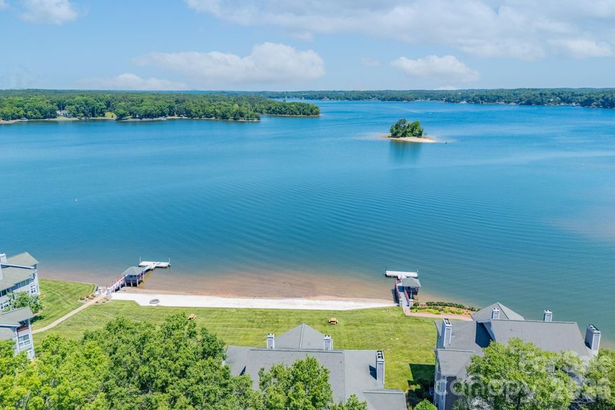 Welcome to Lake Club. Come experience this rare, resort style community on the banks of Lake Wylie. 703 Lake Club is a must see! A true turn key property. High-end finishes & 10ft ceilings throughout. The open floor plan is great for entertaining. Oversized windows provide an abundance of natural light and views of the lake. Large kitchen with island, SS appliances, granite countertops, large pantry, roll out shelving & bay window. The expansive lake views in the primary feel like you're living on vacation. The sunroom is great anytime of day, anytime of year. Take advantage of the recent upgrades; remodeled primary & secondary bathrooms, whole home paint, replaced all light fixtures, added motorized curtains in living room & primary bedroom, replaced sunroom fan, replaced & tinted 5 window panes, converted 3rd bath to walk-in storage. (Plumbing still intact if desired) All of this plus the community amenities of the pool, sandy beach, fire pit, floating docs, canoe/kayak launch, playground, tennis and two covered piers with grills. NO STEPS to get into or inside the unit. Conveniently located next to the beautifully renovated Ebenezer Park & RH airport. Marina next door offers boat slip rentals. Come take a look today! Showings to begin, Friday (5/22) at Noon.