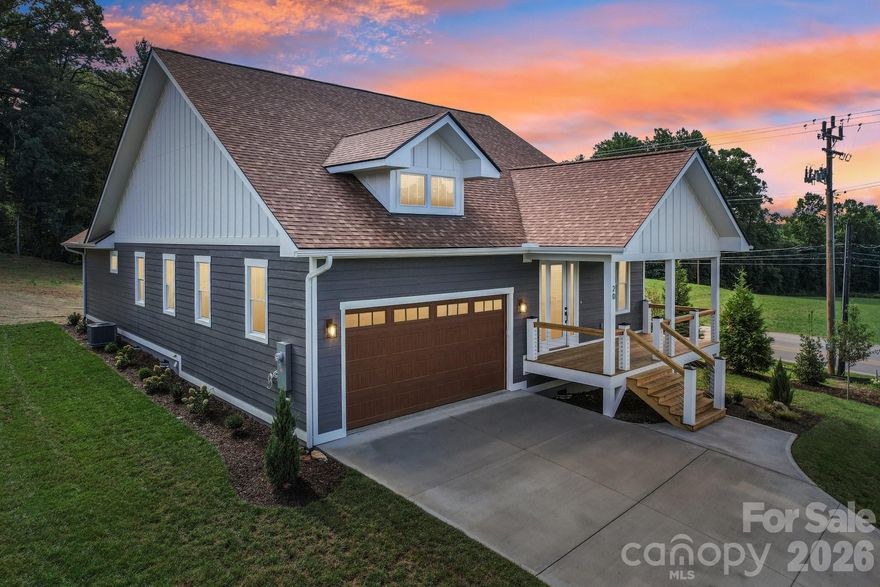 This newly constructed luxury spec home is the epitome of contemporary living, showcasing impeccable craftsmanship, attention to detail, and modern comfort. With a single-story ranch-style design spanning 1,870 square feet. The home features 3 generously sized bedrooms and 2 bathrooms, providing ample space for family and guests. The heart of the home is the modern kitchen, complete with granite countertops, high-end appliances, and a functional layout that makes meal preparation a breeze. Experience the luxury of Engineered hardwood floors 50 year finish warranty that grace the home. All closets feature built-in organizers, enhancing organization and storage options. Cozy up by the gas fireplace on cooler evenings, while enjoying breathtaking mountain views year round. This home combines the tranquility of a mountain setting with the convenience of being minutes from downtown Hendersonville. Whether you're looking for a primary residence or a vacation retreat.