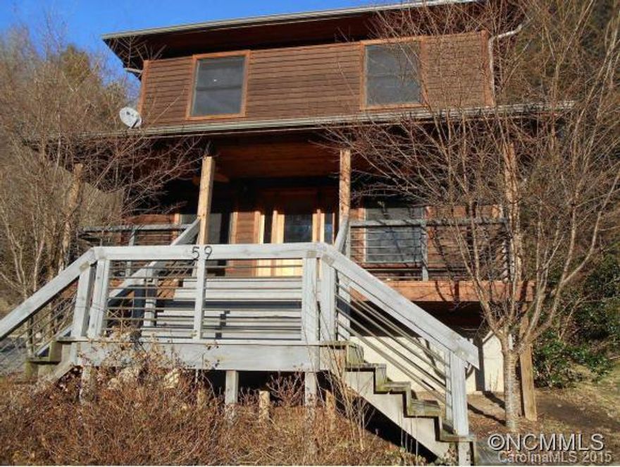 Luxurious "Not So Big House" Simple, elegant living with all the amenities.Home has 2 beds 2 baths, open media room, gleaming maple floors, 9 ft ceilings, recessed lighting,cherry cabinets,granite counters,stainless appliances and slate bathrooms. Open floor plan with great outdoor living spaces, stonework, and natural stream! Lovely and bright-walk to Main Street cafes restaurants, events, shopping, river,island, while only 23 mins to Asheville!