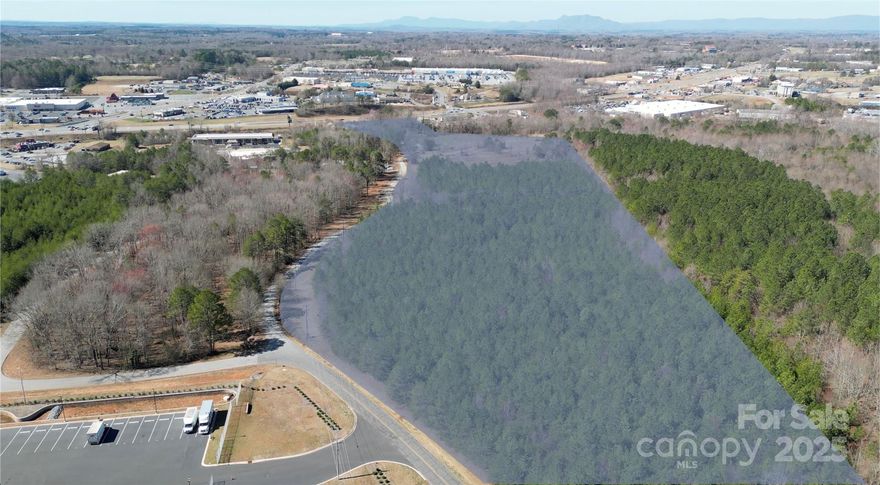 Prime 20.86-Acre Development Opportunity in Forest City, NC

This exceptional 20.86-acre property is strategically located in the heart of the retail corridor of Forest City, NC, offering unmatched development potential. Just a few miles from the Hwy 74 exit, the site is surrounded by high-traffic retailers such as Lowe’s, Walmart, and Belk, making it an ideal location for new commercial or residential projects.

The property benefits from high visibility and easy access, thanks to its proximity to popular brands like Chipotle and Starbucks, which have recently opened in the area. This increasing consumer activity in the region signals strong future growth potential.

With its flat topography and all utilities already on-site, the property is ready for development. Whether you’re looking to create residential spaces like apartments, single-family homes, or townhomes, or possibly a big-box store or shopping center, this site can easily accommodate a wide variety of projects.