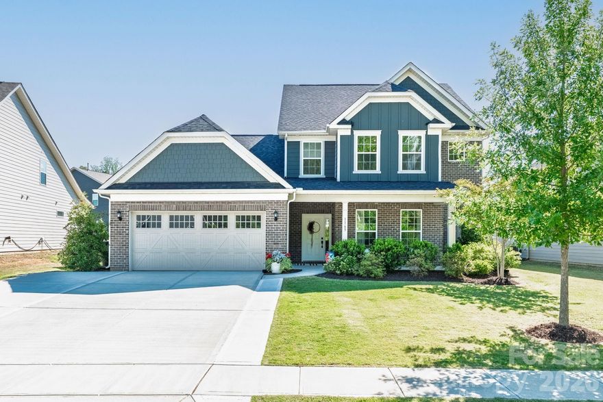LOCATION! LOCATION! Welcome to this beautifully upgraded, move-in ready modern home located in highly desirable Indian Land. Enjoy lower taxes while being just 10 minutes from Ballantyne, downtown Fort Mill, Kingsley, and Baxter Village. Conveniently located near the new Costco, Target, Lowe’s Foods, MUSC hospital under construction and with easy access to I-77 & I-485, this home truly offers the best of location and lifestyle.
This stunning, well-maintained home is available for a quick close and features a bright open-concept floor plan designed for both everyday living and entertaining. The main level includes a dedicated office, while the spacious loft upstairs offers flexibility and can easily be converted into a 5th bedroom. Step outside to a large backyard with mature trees, creating the perfect setting for relaxing, entertaining, or enjoying added privacy.
Storage is exceptional throughout the home with 13 closets, including walk-in closets in every bedroom, multiple hall closets, under-stair walk-in storage, linen closets, and pull-down attic access.
Thoughtful homeowner upgrades throughout make this home truly stand out, including LVP flooring (2025), tankless water heater (2022), custom paver patio with sitting wall and lighting, full perimeter fencing, professionally designed landscaping with mature trees and plants, irrigation system with WiFi controls and rain sensors, driveway extension for additional parking, upgraded lighting and ceiling fans throughout, and professionally installed SOLYX UV window tinting with transferable 10-year warranty.
Additional custom features include energy-efficient top-down/bottom-up honeycomb blinds and a beautifully added custom bar area with wine fridge, perfect for entertaining and giving the home a modern luxury feel.
Turn-key, modern, and loaded with upgrades, this home is the perfect blend of comfort, style, functionality, and unbeatable location!