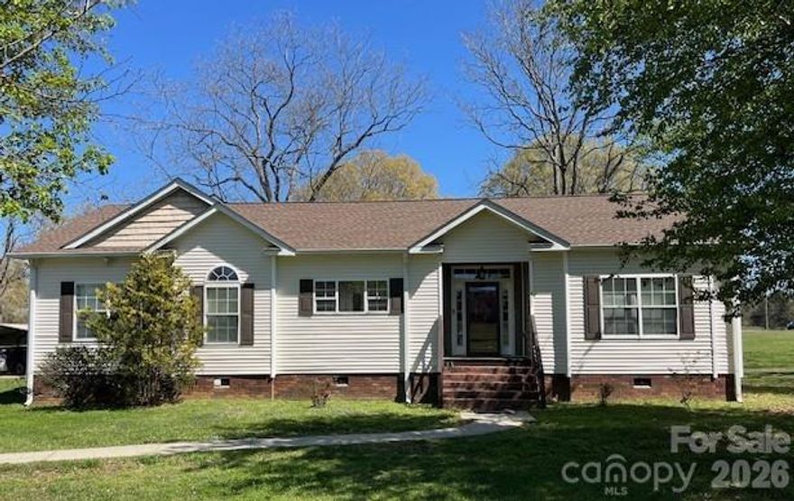 This charming 3-bedroom, 2-bathroom home offers 1,640 square feet of thoughtfully designed living space, blending easy maintenance with a warm, inviting atmosphere. Tucked away on a quiet level lot just off Springs Road, you’ll enjoy a peaceful retreat that is perfectly positioned for a stress-free lifestyle. The location offers short drive times to the area's top destinations. You are just minutes from Downtown Conover and from the heart of Downtown Hickory, making it easy to enjoy local restaurants, shops, and seasonal events like the Hickory 5K Series. Major regional employers and essential services are also within reach, including Catawba Valley Medical Center and Frye Regional Medical Center. Inside, the heart of the home is a cozy living room with a fireplace. The kitchen features ample cabinet space and a central island that’s sure to be the hub for morning coffee preparing meals for family and friends. The primary bedroom suite features a walk-in closet and a primary bath with a double-sink vanity, a separate shower and a garden tub made for relaxing. With two additional bedrooms and a second full bath, there is plenty of room for everyone to feel right at home. Outside, the back deck provides a great place for summer BBQs and the spacious, level yard provides an ideal location any number of outdoor activities.