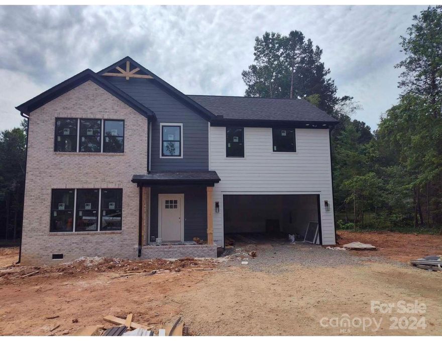 New construction house! Open floor plan! Lots of windows! 3 bedrooms Plus an office! Elegant kitchen with upgraded fixtures! White shaker cabinets with soft closing drawers! Quartz countertops, white subway tile backsplash and all stainless steel appliances are included! Engineered hardwood downstairs and plush carpet upstairs! Large Primary suite with beautifully designed bathroom featuring free standing tub and all marble tile shower! Custom shelving in all the closets! Stunning deck area! Excellent quality throughout! Builder provides a 1-10 home warranty through StrucSure! No HOA!