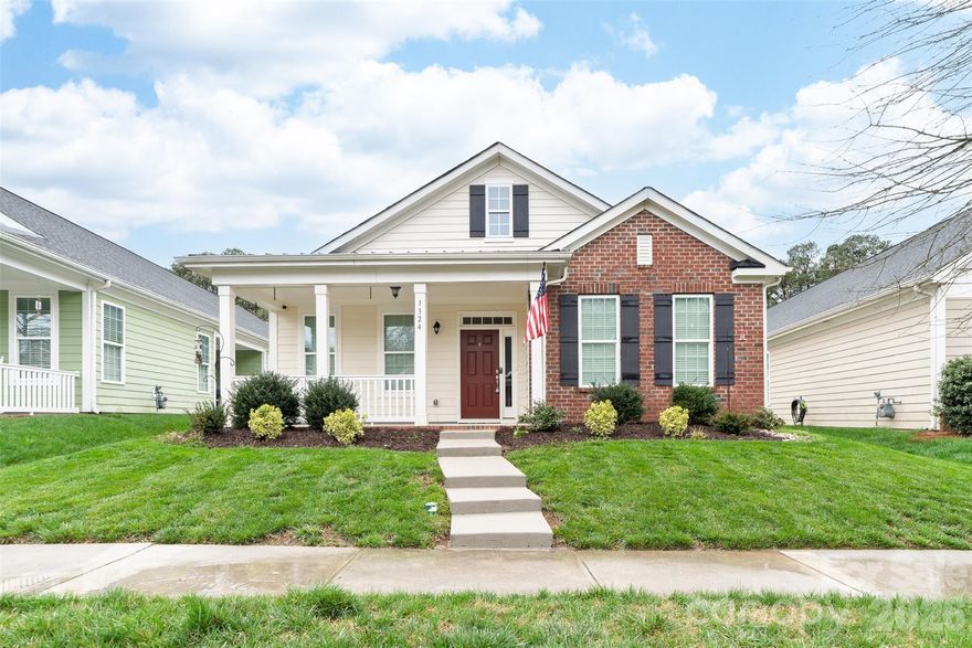 Welcome home to this charming cottage-style residence offering timeless curb appeal and thoughtful design throughout. Featuring a welcoming covered front porch, this home blends classic brick and siding for a warm and inviting exterior. Step inside to an open and functional floor plan perfect for both everyday living and entertaining. The spacious living area flows seamlessly into the kitchen and dining space, creating an ideal gathering environment. The private primary suite provides a peaceful retreat with tiled shower and walk-in closet. The secondary bedroom is just as generous in size with ample closet space. An additional flex space offers wonderful versatility — ideal for a home office, study, fitness room, or easily converted back to a third bedroom to suit your needs. Enjoy outdoor living with a beautifully maintained yard and fenced-in side patio — perfect for morning coffee or relaxing evenings. Eagle Park is walking distance to all that Downtown Belmont has to offer. Don’t miss your opportunity to make this move-in ready home yours!