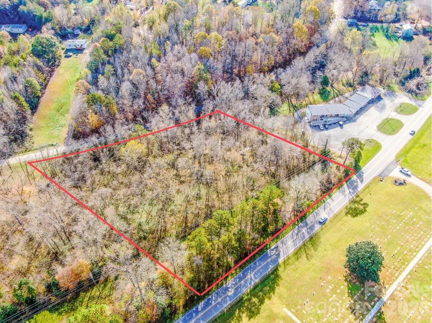 Great commercial opportunity directly on Hwy 21!  Statesville address but just outside of Troutman and near the approved 774 acre residential/retail development Wakefield Village in Barium Springs.  300 feet of road frontage.  Neighborhood Business zoning which allows for a multitude of uses.  Owner is also selling a strip mall on 2.72 acres adjacent to this.  See MLS 4335415.