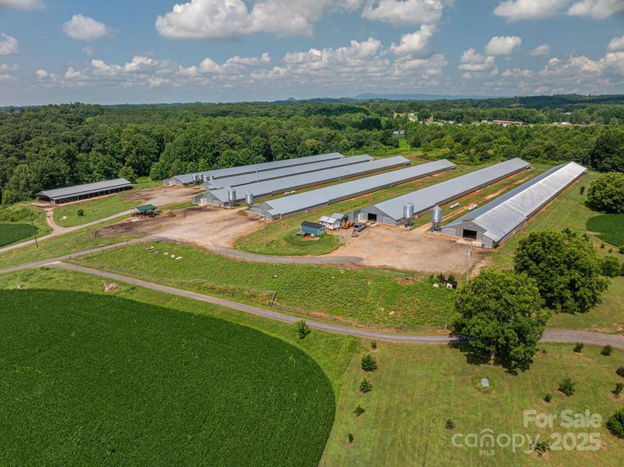Excellent income-producing poultry farm on approx. 82+/- acres in Vale, NC. This Turnkey Operation includes 6 active broiler houses (Two built in 2007, three built in 2009, and final one built in 2010) currently integrated with Tyson and a 2 story 3BR/3BA with an office, main residence built in 2019 featuring 2700+/- sq ft HLA & 1600+/- sq ft unfinished basement! The land offers multiple potential revenue streams with row crop production, wooded acreage, and creek frontage. Strong potential for continued poultry production or diversification into other ag ventures. Ideal for investors seeking agri-business income, with residential and land value upside. Shown by appointment only.