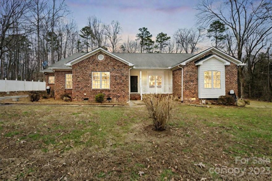 This charming 3-bedroom, 2-bath ranch in the scenic Mt Ulla offers a delightful blend of comfort and nature's beauty. Newly refinished hardwoods welcome you into a home that has been freshly painted in neutral tones, creating a serene atmosphere throughout. With almost an acre of land, this property provides ample space for outdoor enjoyment. For those who appreciate garage space, this home is a dream come true, boasting tons of room to accommodate your vehicles and storage needs. Nature lovers will find paradise in the surroundings, with the property offering a haven for those seeking a connection with the outdoors. Come see it today!
