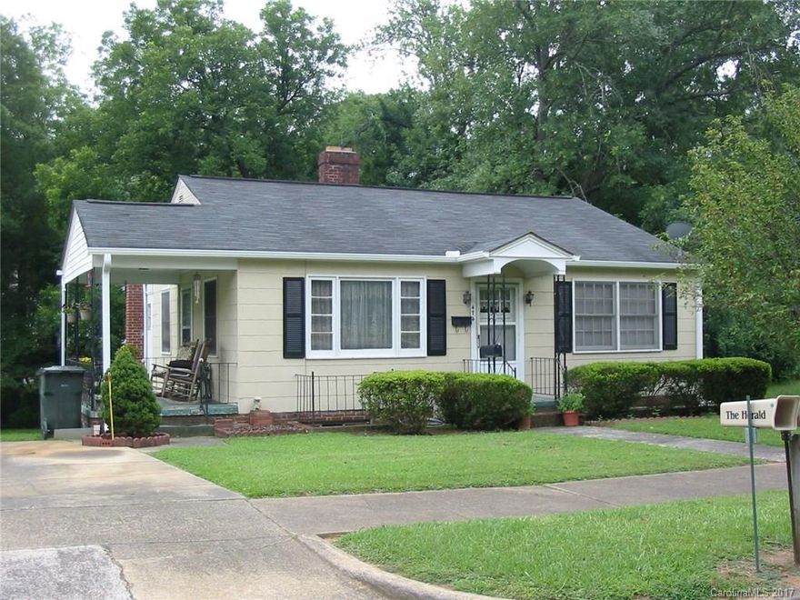 Very nice investment property, 2 bedroom 1 bath on main floor with a 2 bedroom 1 bath basement with it's own entrance, 2 rents being collected, carpet, wood, vinyl, tile, new gutters, new hot water heater, great lot with beautiful back yard, close to shopping, and I-77