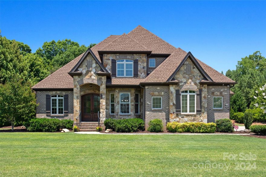 Estate Living at its Finest! Custom built all brick home on the edge of the cul de sac in Eppington South with attention to detail at every turn. Primary ensuite on main with gourmet kitchen including top of the line Electrolux appliances; 36" dual fuel stove/oven, wall oven & built in microwave that is also air fryer, steamer, roaster or dehydrator and cyber controlled, refrigerator, dishwasher and beverage chiller. 4 additional bedrooms and office or library room up with 2 additional full baths. Storage you ask, oh my yes we have that covered with foam insulation that maintains temperature control. Covered rear porch with tv and 28,000 gallon inground gunite pool with deck jets, sun shelf and expansive deck surround for multiple entertaining areas. Manicured landscape, irrigation, fenced rear yard with room for yard activities and fun for all ages. You do not want to miss this well maintained estate living home!