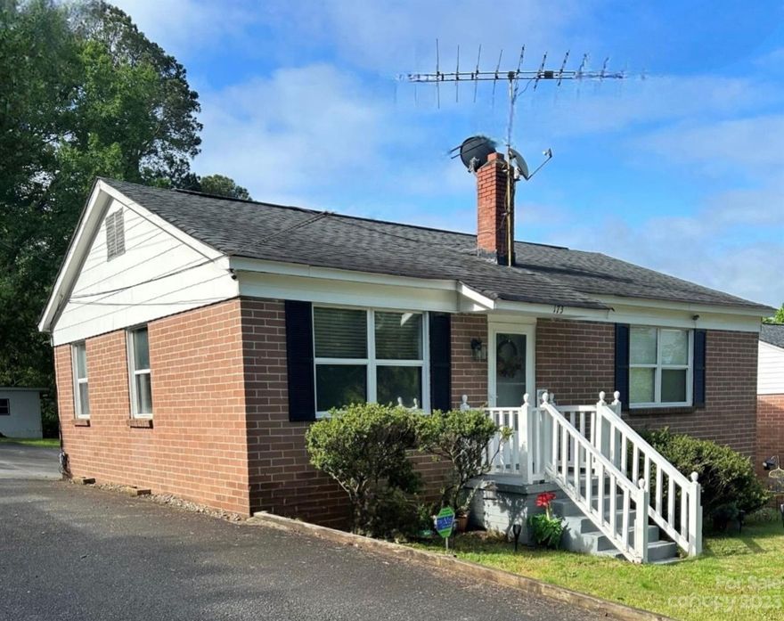 Welcome home to this brick, ranch charmer with a two-car garage and large shop! This beautiful lot has a paved driveway, mature trees that offer shaded areas and a fenced-in yard. The 483SF heated garage offers plenty of room for vehicles and storage. The large shop has shelving and a work bench with plenty of space for working, crafts or potentially a suite outside of the home. This home is conveniently located just a few blocks from grocery stores and restaurants. Freshly painted walls make the home feel warm and cozy. The newly refinished hardwood floors are beautiful. There are hardwood floors throughout the living areas of the home. New flooring, light fixtures, door handles and bathroom accessories have been recently added to the home as well. There is a large bonus room that could potentially be an additional bedroom that features a walk-in closet/laundry room. It has lots of space for family gatherings and entertaining. It is all you want and need with convenience!
