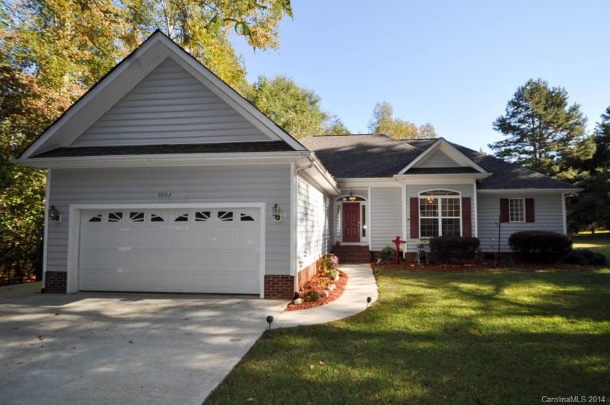 Enjoy the country-type setting conveniently located minutes from Ballantyne Area. This beautiful ranch with a split floor plan is tucked away on over half acre lot. New roof installed in August 2014, new Garage Motor and Door Opener installed Feb 2014. Spacious living room with gas fireplace, Custom built shelving in living room and 3rd bedroom. Built in gas line for grill on deck, no need for propane tanks. Pull down attic in garage has TONS of storage a MUST SEE. Best of all, no HOAs!