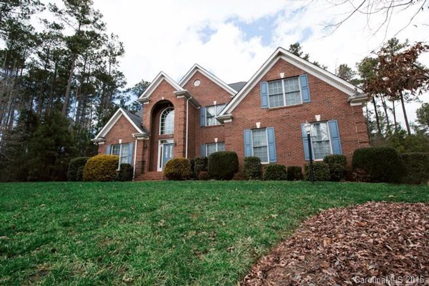 Beautiful brick home! Large, open floor plan on private, 1+ acre property. Master bedroom on main includes his and hers master bath plus sitting area. Large bonus room, ample storage and several walk out attic spaces! 2 story foyer and living room, french doors that open to the deck and spacious back yard. New laundry room floor with raised platform for W/D. Easy access to I-77, SR 160, 485 and Hwy 521.