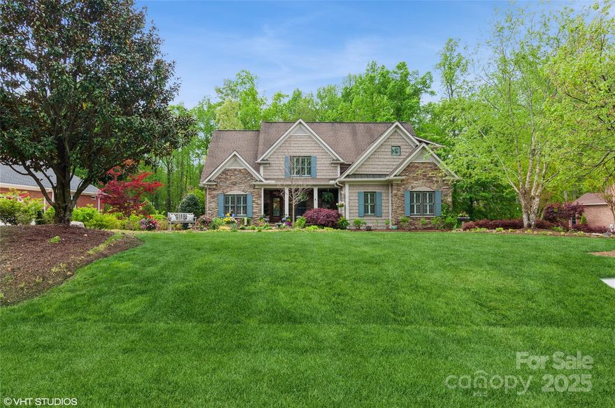 Nestled in WATER EDGE, walking distance to LAKE WYLIE , this beautifully maintained 5 bedroom/4.1 bath is ready for your to call home.  Gorgeous landscape w/ mature trees. Hardwoods on main & 2nd floor living areas. Vaulted & tray ceilings, custom millwork detail throughout. Open concept floor plan w/ todays easy living.  Abundant light streams thorugh the floor to ceiling windows.  Plantation shutters throughout home.  Sunroom, Family Room, Kitchen. First floor primary suite - w/ tray ceiling & ensuite bath- w/ tub, double sinks, shower & oversized walk in closet. 2nd floor has 3 large bedrooms - w/bath access & loft w/built in cabinetry for office.  Full walk out basement w/ 2nd family room w/FP,  billiard room, wet bar, bedroom w/ full bath & a unbelievable  storage.  Three heating/ AC systems zoned, full generator. Waterproofed decking creates a lower level space for year round enjoyment. Custom patio a tranquil retreat for cozy fires! Come enjoy the Water Edge clubhouse and pool!