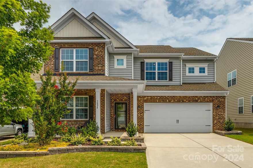 Welcome Home! This popular Forsyth floor plan boasts an open layout, updated wide-plank LVP floors, & new carpet! The main level features a private study with French doors, a formal dining room with built-ins, and an open great room with gas fireplace. The large, spacious kitchen will have you being the envy of the neighborhood with an abundance of cabinets, granite counters, and SS appliances. The second level is where you will find the airy primary bedroom with an en suite complete with double sinks, a garden tub, & a separate shower. Also upstairs, you will find four more bedrooms, two full baths with double sinks, and the laundry room. The 5th bedroom is extra-large and provides plenty of room to be converted into a bedroom with flex space. Step outside onto the extended paver patio & enjoy the built-in grill and brick fireplace overlooking the fenced backyard. Neighborhood amenities include a clubhouse, fitness center, outdoor pool, dog park, playground, walking trail, and pond.