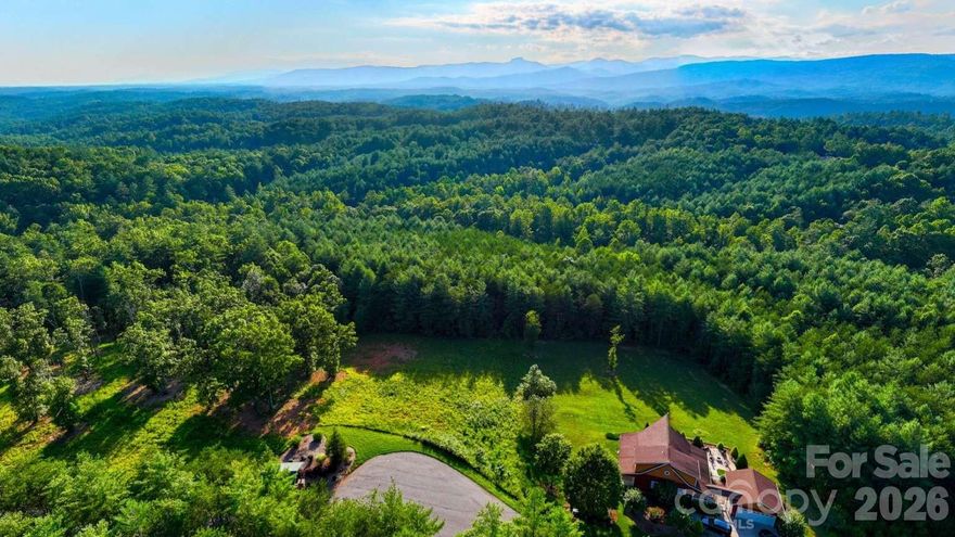 This 7.09-acre lot in the gated Old Oaks Estates community offers privacy, paved cul-de-sac access, and westward-sloping views near Morganton, NC. The community allows full-time residences or short-term rentals and has basic covenants in place to help protect property values. The parcel features a cleared homesite, electricity nearby, and will require well and septic installation. Minimum build size is 1,600 sq ft for a one-story home or 2,000 sq ft for a two-story home, with limited RV and tent camping permitted. Just minutes from Morganton and under two hours from Charlotte. If paved access, privacy, and usable mountain land are what you’re looking for, reach out today to learn more or reach out today for more information.