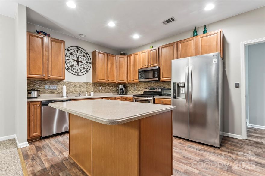 Welcome to this immaculate 2-bedroom, 2-bathroom patio home, beautifully upgraded and truly move-in ready! Spanning 1,717 square feet, this property combines comfort, convenience, and exceptional value, listed at just $375,000. Located in a tight-knit, friendly community, this home is perfect for those seeking a relaxed lifestyle with minimal upkeep—lawn maintenance is covered by the HOA! This home is designed for modern living with thoughtful upgrades throughout, offering a perfect blend of style and function. Open-concept living spaces create a welcoming ambiance, ideal for both relaxation and entertaining. Enjoy peaceful mornings and evenings in the screened-in porch overlooking a serene yard. With a generous 2-car garage, you’ll have ample space for parking and additional storage. Priced well below recent comparable sales, this property represents an incredible value in today's market. Don’t miss your opportunity to own this stunning home in a very desirable community