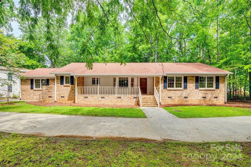 Welcome home to 1520 Falconwood Circle.This is a Sonny Collins custom built home where the quality and craftsmanship shines through!  As you soon as you walk inside the freshly painted home you will be greeted by the  HUGE family room with fireplace that opens into the formal dining room and onto the screened porch.  The kitchen has been updated with quartz countertops, subway tile backsplash, and new appliances with a sunny breakfast area.  This ranch style home offers spacious bedrooms with new carpet.  The primary suite is oversized with updated bath / shower, dressing area, and large closet.  The guest bath is updated with new shower and counter tops.  The laundry room has plenty of space with a wash sink, and don't miss the third bath complete with shower!  Double car side load garage, utility room, new water heater, new HVAC and ductwork, two-level barn for extra storage with electric. Over an acre lot in the county but very convenient to the city limits. This is a rare find!