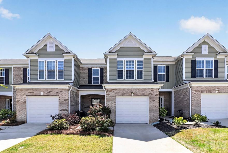 Welcome to easy, low-maintenance living in Catawba Village—zoned for top-rated Fort Mill schools! This 1-car garage townhome features an open layout with a welcoming foyer, spacious family room, dining area, and an upgraded kitchen with 42" cabinets, Luna Pearl granite, tile backsplash, and stainless steel appliances. LVP flooring runs throughout the main level for a clean, modern feel.

Upstairs, the primary suite offers a tray ceiling and an upgraded bath with dual sinks and a tiled shower. Two additional bedrooms provide flexibility—perfect for guests, a home office, or both. Out back, enjoy a private, fenced yard ideal for relaxing or entertaining.

Additional highlights include 5.1 surround sound pre-wire, Nest doorbell, and backyard camera. Located in a gated community with a pool, clubhouse, pond, and walking trails—all with low HOA dues of $175/month. Convenient to highways, shopping, and dining—this one checks all the boxes!