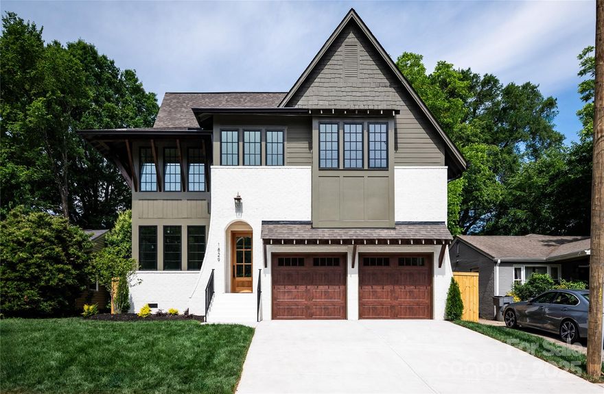 A statement of modern luxury, 1829 Union St is a stunning three-story new construction by Keen Building Company. With over 4,300 sq ft of thoughtfully designed living space, this 5-bedroom, 4-bath home offers room to live, host, and grow without compromise. The main level features a gourmet kitchen with custom cabinetry and walk-in pantry, flowing effortlessly into expansive living and dining areas perfect for entertaining. A private office provides a quiet workspace, while the upper levels offer five spacious bedrooms, including a primary suite with dual vanities and an oversized walk-in closet. The rare third-floor bonus room adds flexible square footage—ideal for a media room, playroom, or guest retreat. A covered back porch and a fully fenced yard create a seamless indoor-outdoor experience. With designer finishes, a two-car garage, and exceptional space at every turn, this home is a standout opportunity in one of Charlotte’s fastest-growing neighborhoods.