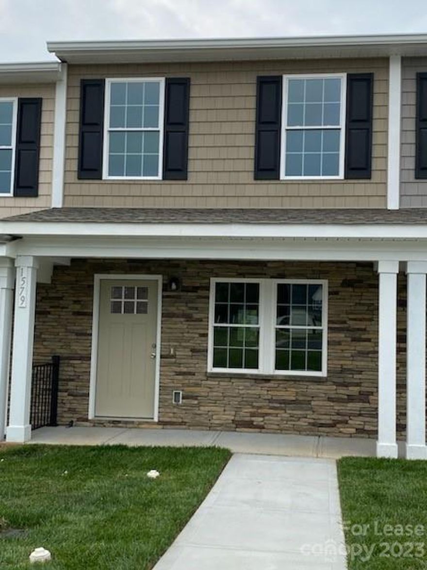 Beautiful new townhomes in the Oak Hill community. Be the first to move into this wonderful home with neutral colors and an open floor plan. Stainless steel appliances, washer and dryer, and lawn maintenance are all included- ready for you to move in! Loads of charm with a partial stone exterior, covered front porch, and back patio.  The kitchen is beautifully finished with pendant lights that accent the kitchen bar and extra storage is provided in the spacious kitchen pantry. Come see this home today! Interior pictures are representative of similar finished unit in the same community. Agent only available M-F 8:30am-5:30pm. Any inquiries after that time will be addressed the following business day.