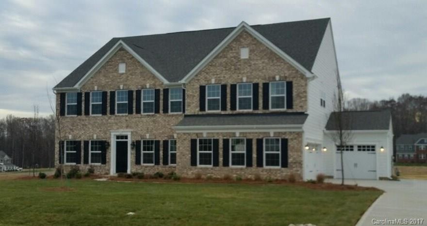 .93 Acre!! RARE MOVE IN READY HOME OPPORTUNITY! Don't miss this stunning brick front Versailles in Union County's premier Brookmeade neighborhood. Almost an acre! Soaring two-story great room w/ floor to ceiling stone fireplace, designer kitchen w/ huge island, hutch, planning desk, double ovens, granite on ALL counters, gleaming hardwood floors entire main floor, arched doorways, loft, luxury master suite, tile surrounds in all baths.