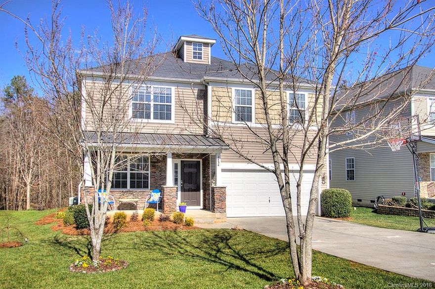 Welcome Home to gorgeous hardwoods, fresh, neutral paint, and a bright open floor plan! This fantastic 4 bed/2.5 bath home with loft boasts a huge master bedroom with decorative trey ceilings and spacious walk-in closet, and a center furniture style kitchen island w/ granite and bar seating is perfect for entertaining! Enjoy relaxing evenings on the covered front porch or wonderful wooded privacy on the back deck! Don't miss this beautiful home!