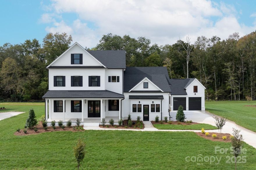 BRAND NEW luxury home w/ 5 car garage on premium lot in popular Broadmoor community zoned for Marvin schools! Gorgeous River Birch floor plan features both a large primary suite (expanded), additional guest suite w/ dedicated bath on main floor + plus private study. Farmhouse elevation features a covered front porch w/ double glass entry doors. Bright open floor plan showcases a designer kitchen equipped w/ a 6 burner gas cooktop, 10 foot quartz island w/ waterfall edge, dovetailed soft close cabinet drawers + soft close doors & expansive walk in pantry w/ custom wood shelving. Kitchen overlooks Expanded Great Room w/ vaulted ceiling w/ wrapped beams, ribbon gas fireplace & luxury folding accordion doors. Primary suite features expansive closet w/ custom built ins & a spa luxury bath w/ vessel tub & large shower w/ dual shower heads. Upstairs features 3 oversized secondary rooms plus a large bonus room. Enjoy the great NC weather on the spacious covered porch featuring a gas fireplace.