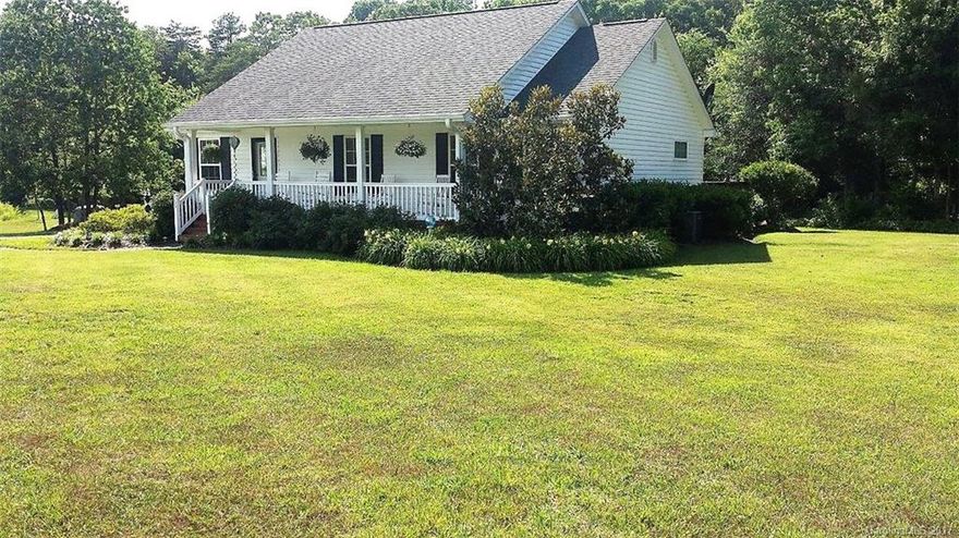 Beautiful 3BD/2BR home on 2.73 acres in the country. Move in ready & features its own private pond! This well maintained ranch is fantastic if you are looking for privacy & peace. Features include large Kitchen w/custom cabinets & granite tile counter tops, Master  as tray ceiling & walk-in closet, along w/French doors leading to a 20X20 deck, Master bathroom has tiled shower & a double vanity, large laundry room with a deep sink, 2 car garage with tall ceilings. This home is a must see!