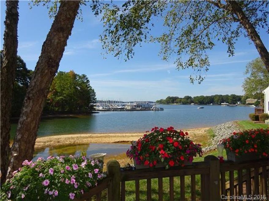 Gorgeous WATERFRONT home in Admirals Quarters. Spacious main level with beautiful views of Lake Norman! Bedroom & full bath on main. Kitchen features granite counter tops and ceramic tile. 3 Bedrooms on upstairs including lrg master w/ tray ceilings, lake view, and 2nd story balcony. Master bth features lrg shower/tub combo and dual vanity sinks. Huge deck facing water with lots of room for entertaining! Community features pool, walking trails, and tennis courts. BOAT SLIP INCLUDED! A must see!