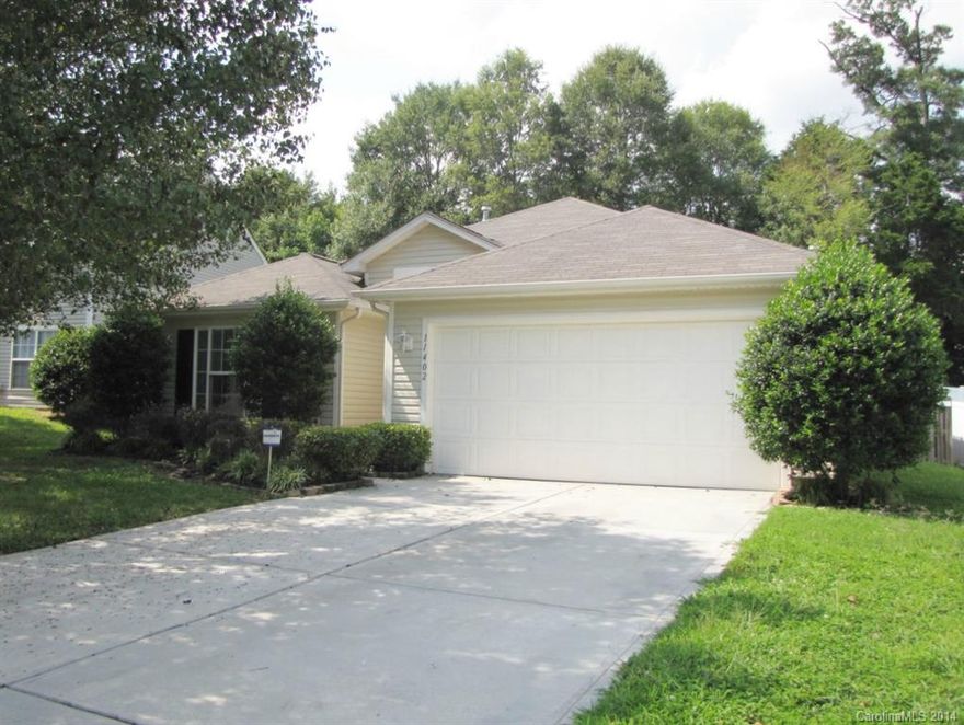 Rent Special!: August rent free w/ move-in by 8/22/14. Located on a lot with mature landscaping, this charming ranch offers a split bedroom floor plan for added privacy. Features include hardwood and ceramic tile floors, vaulted ceilings, and lots of natural light. The kitchen has a pantry and a breakfast bar, and flows into the great room and the breakfast area. French doors access fenced back yard w/ patio. The master suite features a walk-in closet, and a bath with a garden tub and a shower.