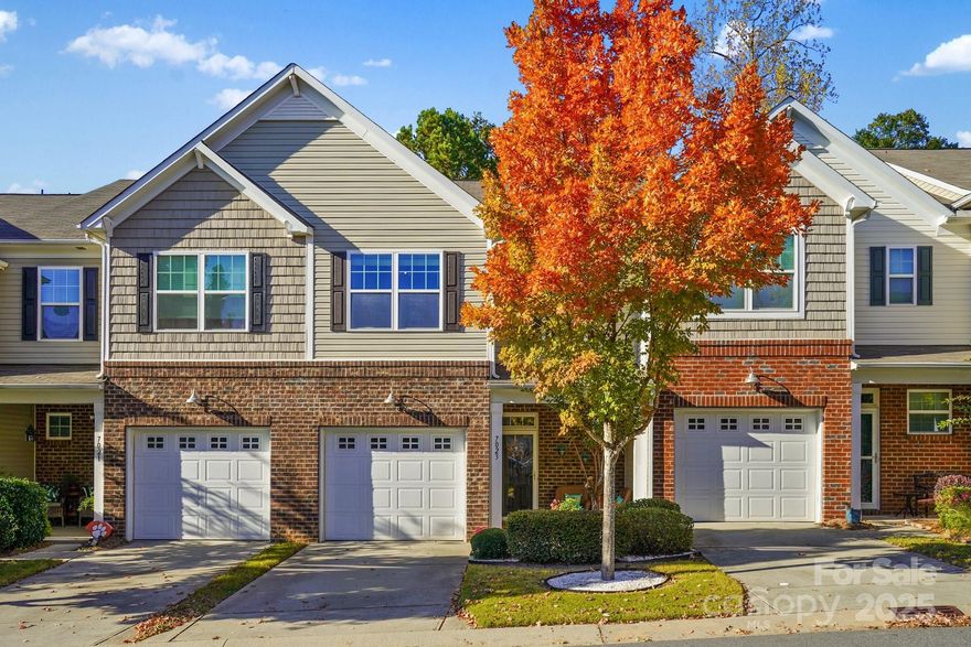 Step inside and instantly feel the warmth, comfort and welcoming vibe! This charming townhome is nestled in the established Woodlands community where you will find beautiful single-family homes, quality-built townhomes, convenient sidewalks, street lights, an elementary school, cabana and outdoor pool! Situated on an inviting street with well-manicured homes and plenty of parking for guests right across the street, you'll enjoy low-maintenance living at the best! Move-in ready and fine craftsmanship make this home a must-see! Enjoy your favorite sip on cozy covered front porch or private back patio overlooking a tree-lined view. An inviting open-concept design is perfect for entertaining or everyday living. The kitchen is well appointed with granite tops, breakfast bar, 42" maple cabinets, tiled backsplash, walk-in pantry and stainless steel appliances (refrigerator to convey!) Designed for comfort and ease, the open living area features beautiful laminate wood floors and a warm gas fireplace that invites you to unwind. The space flows effortlessly into the dining area and kitchen, making it perfect for quiet evenings at home or celebrations. You'll find three bedrooms, laundry room and full bath (freshly painted!) on second level. The generous-sized primary bedroom has a tray ceiling with walk-in closet and spacious en-suite bath features a garden tub, walk-in shower and double vanities. Select interior spaces feature fresh neutral paint, updated fixtures plus NEW A/C unit in spring of 2025! You'll appreciate the attached one-car garage with extra upper shelving and generous interior storage throughout. HOA includes exterior maintenance, lawn care, roof and more! Location is ideal with a quick drive to downtown Rock Hill, Ebenezer Park, Lake Wylie, shops, restaurants, schools and I-77. LOW York County taxes! Make this home yours and start your new chapter of low-maintenance and comfort living in a fabulous wooded community!