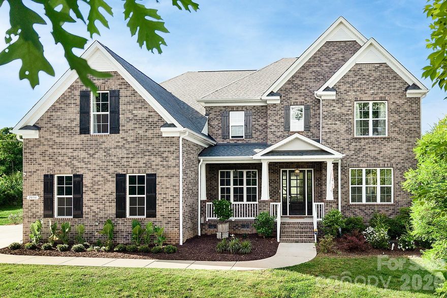 Experience luxury living and exceptional privacy in this stunning, like-new full brick home nestled on 2 full acres in sought-after Marvin. This impressive property offers an outdoor retreat featuring a large covered deck overlooking the expansive patio and backyard, custom landscaping, fire pit, outdoor kitchen with leathered granite countertops and gas grill, extended driveway, and thoughtfully added trees for enhanced privacy. The desirable floor plan features 5 spacious bedrooms, each with its own ensuite bath, including a main-level guest suite. The chef’s kitchen showcases an oversized island, quartz countertops, herringbone tile backsplash, gas range, and a highly functional walk-in pantry with beverage fridge. Luxury details continue throughout with updated lighting and ceiling fans, custom built-ins in the library, fresh interior paint, and a beautifully upgraded fireplace with tile surround, floating mantle, and custom shelving. The under-stair space has been thoughtfully finished as a dedicated dog room or “doggy condo.” The luxurious primary suite offers a spa-like bath and expansive walk-in closet. Additional highlights include a 4-car garage with epoxy-coated floors and freshly painted interior, built-in irrigation, upgraded oversized gutters, large bonus room, and a cul-de-sac lot. Conveniently located minutes from top-rated Marvin schools. Schedule your private tour today!