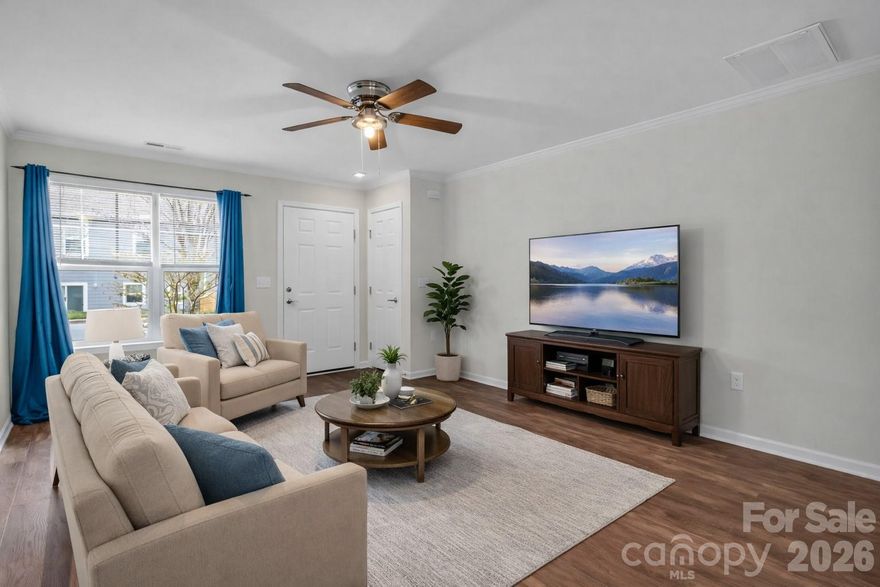 Turn-key and thoughtfully designed, this like-new townhome offers the perfect blend of comfort, style, and convenience. Built in 2020 and owned by one owner since construction, the home lives large with an open-concept layout ideal for everyday living and entertaining. The main level features prefinished wood floors, an upscale kitchen with stainless steel appliances, a highly sought-after natural gas range, and seamless flow into the living and dining areas.

Upstairs, you’ll find well-appointed bedrooms with cozy carpeting. Energy-efficient features, including an ENERGY STAR washer and a natural gas tankless water heater, add modern convenience and long-term value.

Enjoy a low-maintenance, fenced outdoor space with a mix of patio area for grilling and a small grassy section for pets or play. A one-car garage plus driveway parking provides room for two vehicles, with guest parking just two doors down.

Ideally located one street from the neighborhood playground and dog park, and just 8 minutes to Gerber Village and Asheville Airport, and 20 minutes to both Downtown Asheville and Downtown Hendersonville, this home offers low-maintenance living in a highly convenient location.