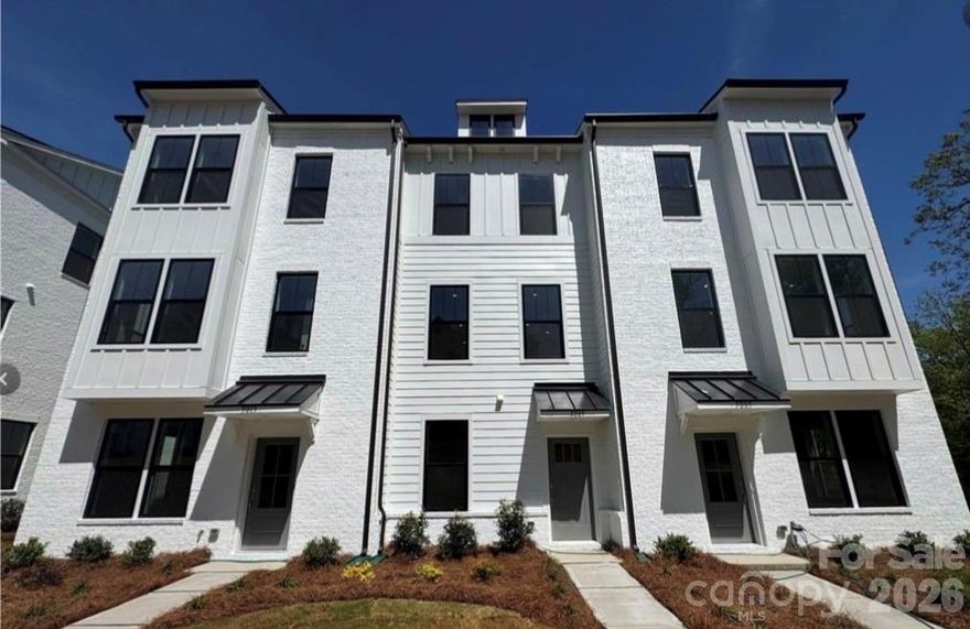 Stunning 3-Story Townhome in Highly Desirable Alexander Providence. Welcome to this beautifully maintained 3-story townhome located in the sought-after Alexander Providence community—just minutes from premier shopping, dining, and everyday conveniences along Providence Road. 

Upon entry from the rear-load garage or Covered front Entry, you’re greeted by a versatile first-floor bedroom or private home office with Ceiling Fan with ensuite full bathroom—ideal for guests or remote work. The bottom floor is covered with Luxury Vinyl Plank Flooring. 

The second level features an inviting open-concept layout designed for modern living and entertaining. The kitchen is the centerpiece, showcasing a spacious island, stainless steel appliances, Refrigerator included, and ample cabinet space, seamlessly flowing into the dining area and great room. Step outside onto the second-floor deck—perfect for morning coffee or unwinding with a good book. Luxury Vinyl Plan Flooring covers the entire 2nd floor.

Upstairs on the third level, retreat to the spacious primary suite featuring dual closets and a luxurious en-suite bathroom with dual vanities, a tiled walk-in shower, frameless glass enclosure, and built-in bench. An additional guest bedroom also offers its own private en-suite bath with a tub/shower combination. For those who own electric vehicles, Owner has installed a plug into the garage for Electric Vehicle Charging - Bring your own Charger. 

This townhouse offers the perfect blend of comfort, style, and location. Schedule your showing today—this one won’t last!