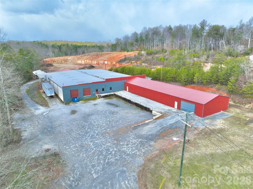 Excellent opportunity to acquire a Cash-flowing Commercial Investment – 2 separate properties/buildings with 1 tenant. $12,875 of gross monthly income with scheduled increases! Currently leased to a well-established & stable woodworking manufacturer, these properties provide over 34,000 sq ft of versatile space suitable for manufacturing, cabinet/woodworking, warehousing, and much more. According to recent appraisal, the locations see between 10,000 and 10,500 cars per day. Industrial Zoning allows for many uses (see attached Table of Uses from County). BUILDING #1 (street number 3083) has a Fire Hydrant on site and consists of 24,460 sq ft of total building space, including 368 sq ft of Office area, 24,092 sq ft of warehouse/shop area, 4 restrooms, 16'10" ceilings, 460V & 240V 3-phase electrical service, 3 Drive-In Garage Doors, 2 Dock High Doors, Loading Dock, industrial fans/several wall units for cooling, & a top-of-the-line Dust Collection System throughout. BUILDING #2 (street number 2171) is located directly across from Fire Department and consists of 10,047 sq ft of total building space, with 697 sq ft of Office area, 9,350 sq ft of warehouse/shop area2 restrooms, 12'10'' ceilings, 460V 3-phase electrical service, 3 paint/spray booths, 3 Drive-In Garage Doors, & central A/C in the office. Both buildings have propane gas heaters as well as their own wood furnace heaters (which they tend to rely on) for heat. Don't miss this wonderful opportunity to obtain monthly cash flow! Contact agent ASAP to schedule a showing!