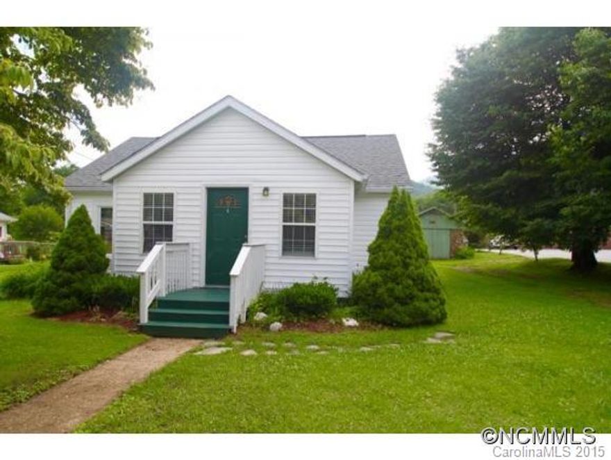 Charming cottage ready for you to love on the growing end of town.  Area is pedestrian friendly w/ sidewalks to church, dining & shopping.  New roof, windows and a fantastic ceiling mount ductless heat pump create an efficient envelope for low utility costs.  A fenced back yard encompasses a level play or garden area with deck.  Versatile stone garage/workshop for storage and projects. Low maintenance exterior- a bonus. Affordable and adorable.