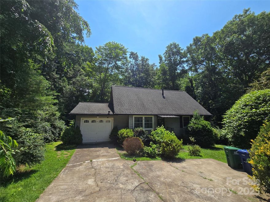 Welcome to 5 Auburndale Drive—a versatile and well-located home in Asheville offering three levels of living space to make your own. With 3 bedrooms, 2 full bathrooms, and a bonus room, this home offers flexibility whether you're looking for home office space, guest accommodations, or room to grow. The newer back deck is perfect for relaxing or entertaining, and the generator adds peace of mind year-round. The property backs up to Buncombe County land, giving added privacy and reassurance that no development will take place behind you. Nestled in a lively, well-established neighborhood, you’ll also love being just minutes from the Blue Ridge Parkway, the NC Arboretum, and the Asheville Outlets. Easy access to I-40 and I-26 makes commuting or weekend getaways a breeze. Come see how this multi-level home can fit your lifestyle—and make it yours today!